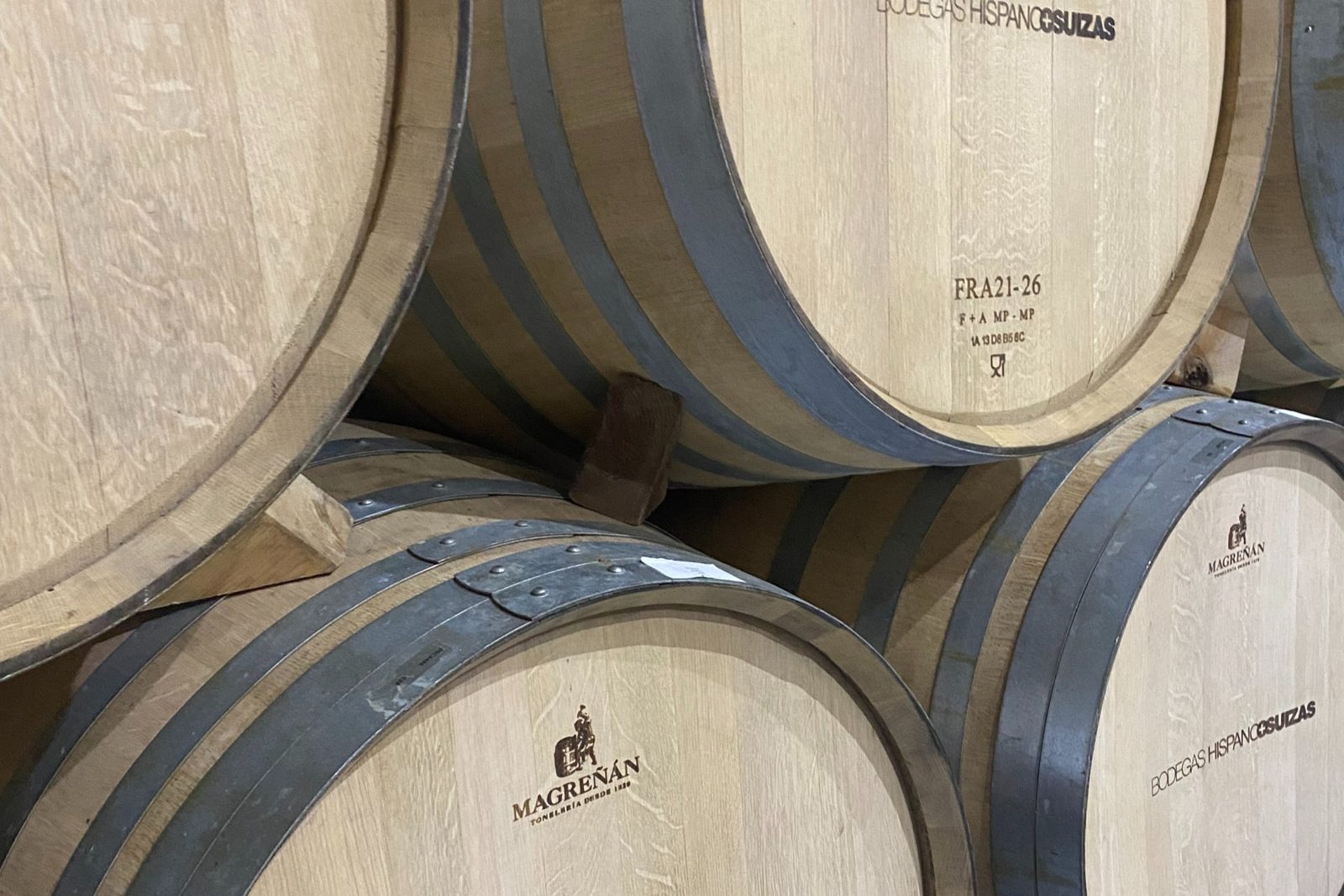 Oak barrels stacked in a local Xaló bodega